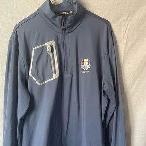 Three quarter zip long sleeve golf shirt w/ 2020 Ryder Cup logo.